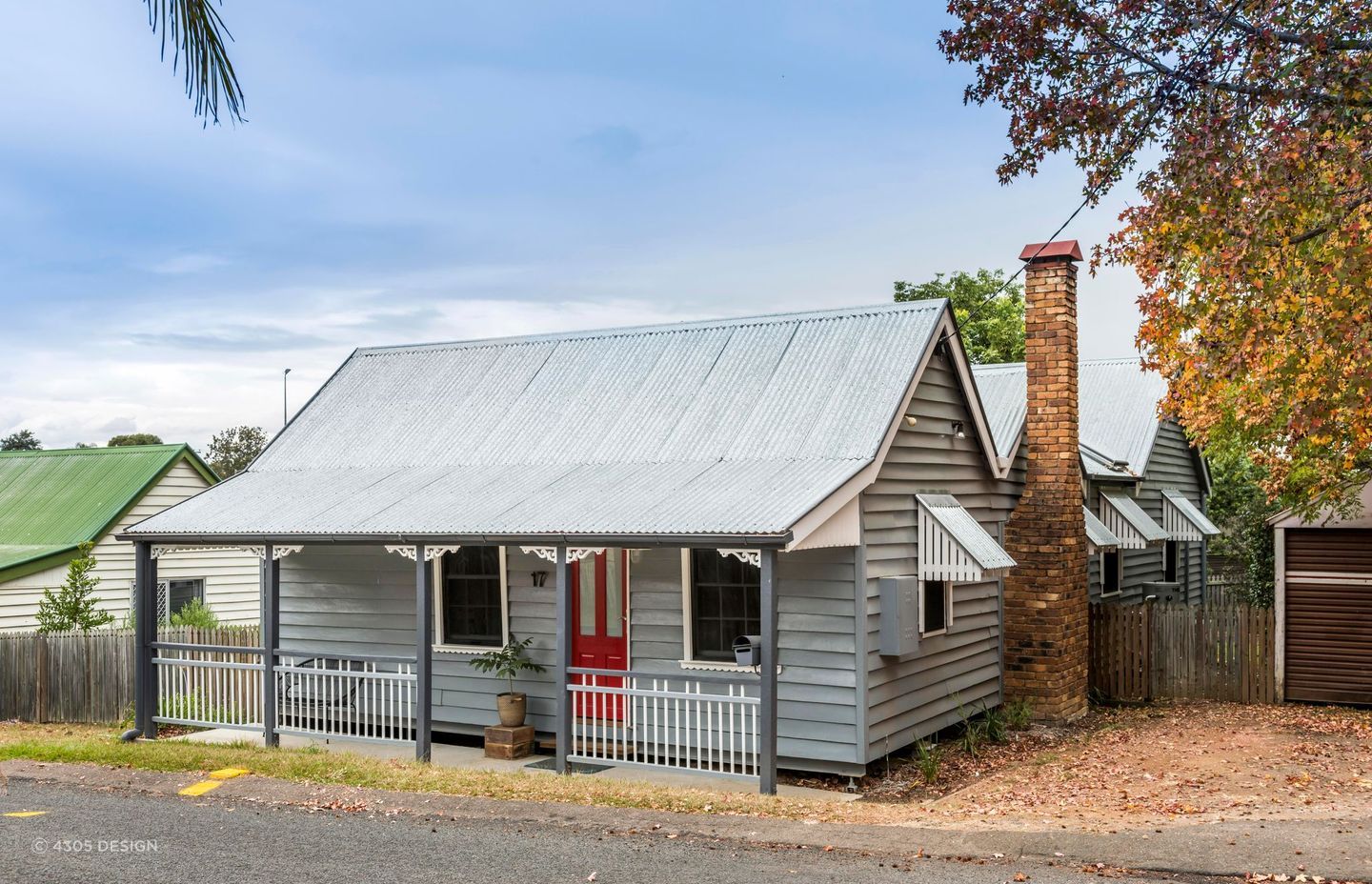 Cottage style front doors often exude a warm and inviting appeal, typically featuring bright, welcoming colours that stand out against traditional, softer-toned exteriors. Featured project Len 43 by 4305 Design