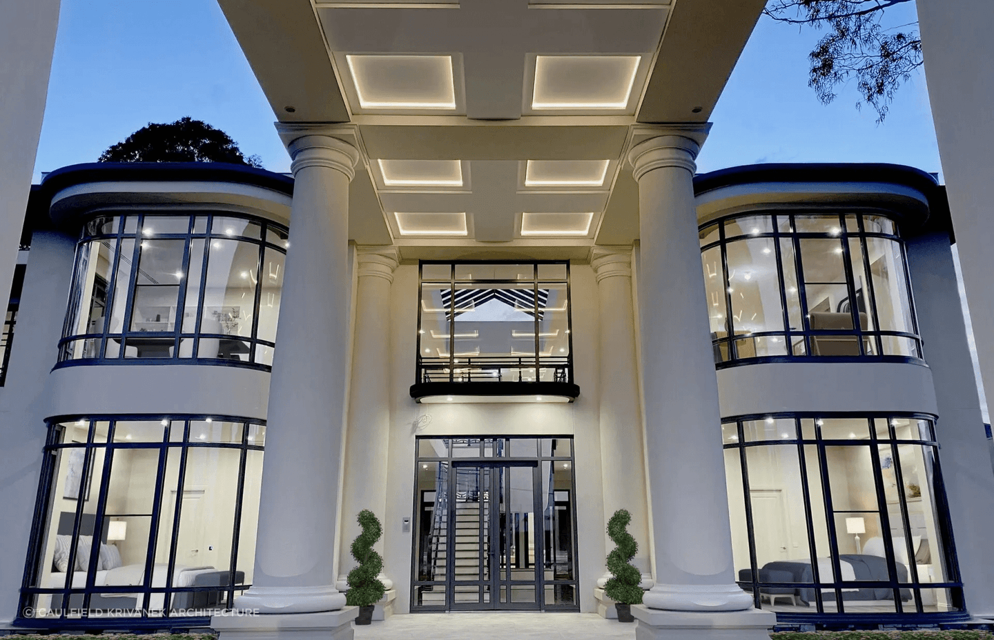 These glass front entrance doors, accompanying the various windows, let in plenty of natural light. Featured project: Lum Road Residence by Caulfield Krivanek Architecture
