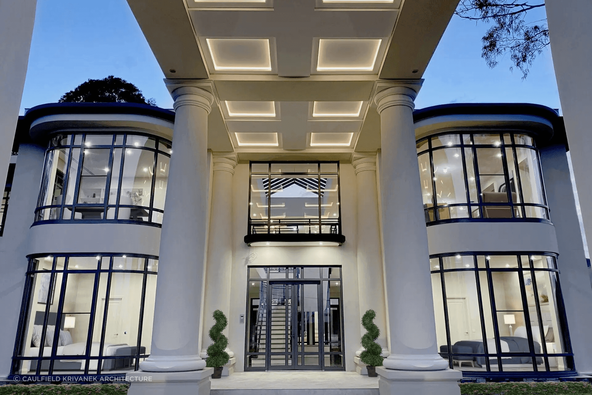 These glass front entrance doors, accompanying the various windows, let in plenty of natural light. Featured project: Lum Road Residence by Caulfield Krivanek Architecture
