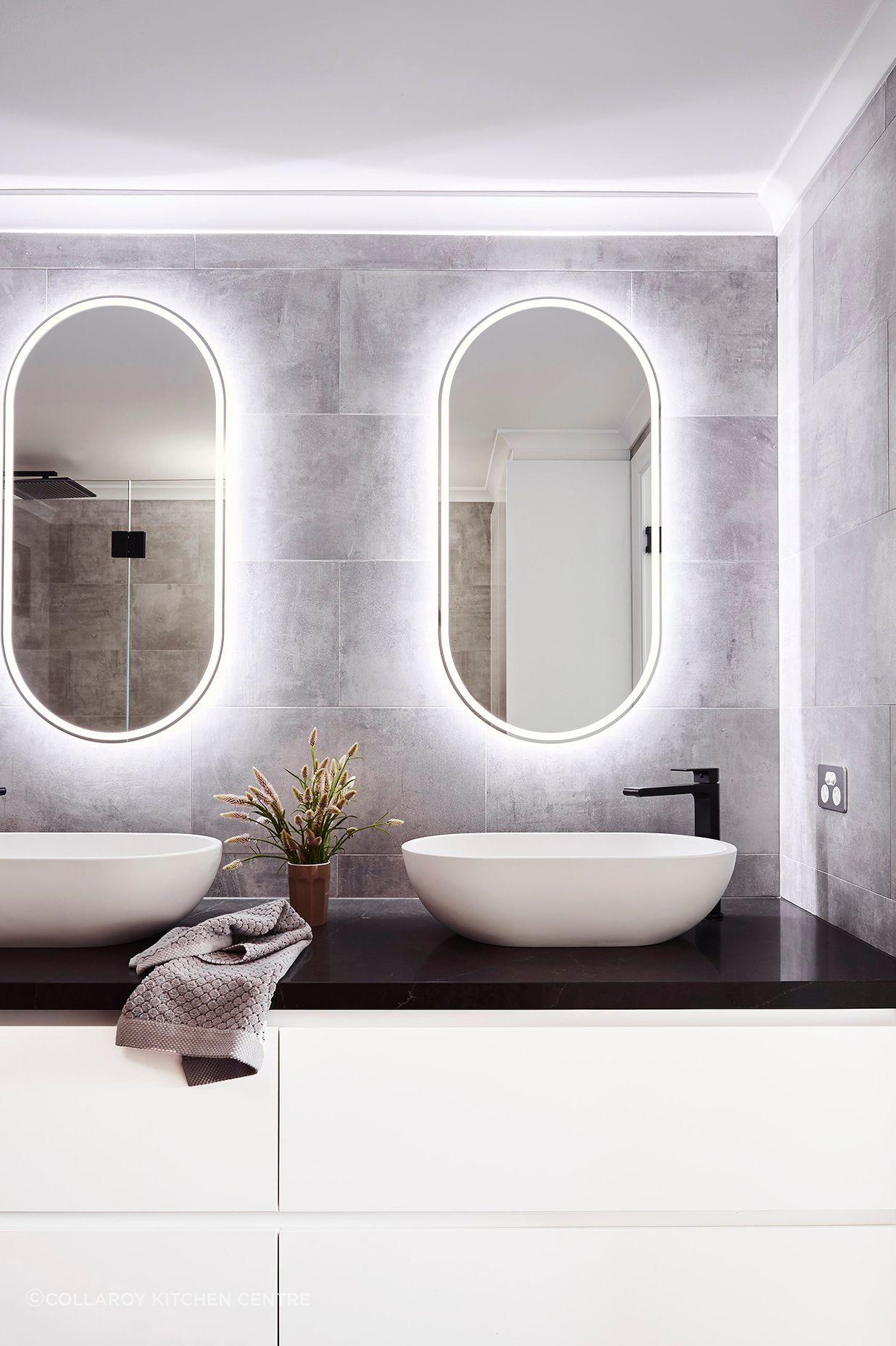 Lighted mirrors are a convenient way to add functionality and extra light to a bathroom