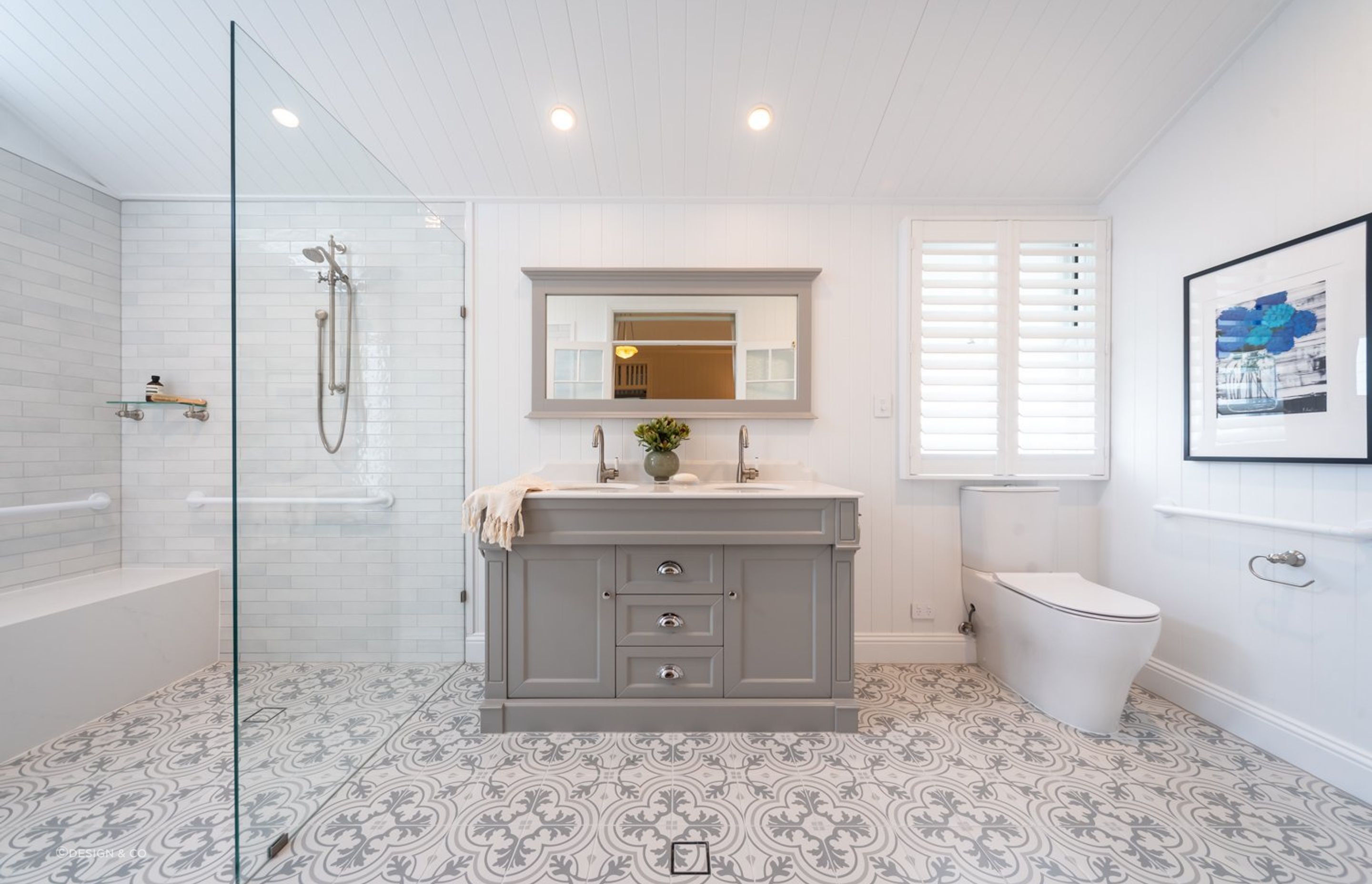 Strategically placing downlights near a special bathroom feature will help it stand out