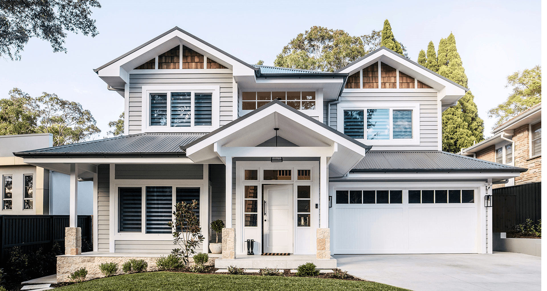 Custom home build construction of a contemporary, 2-storey, family-friendly home that embodies the timeless features of the classic Hampton’s style