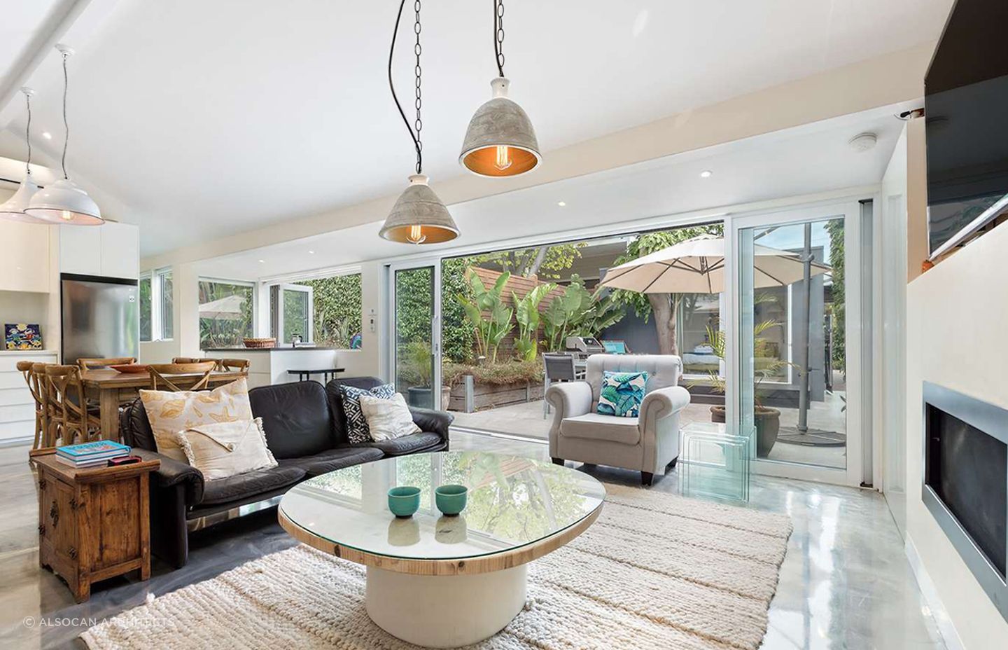 Pendant lights are popular in living rooms, such as in this Melbourne home