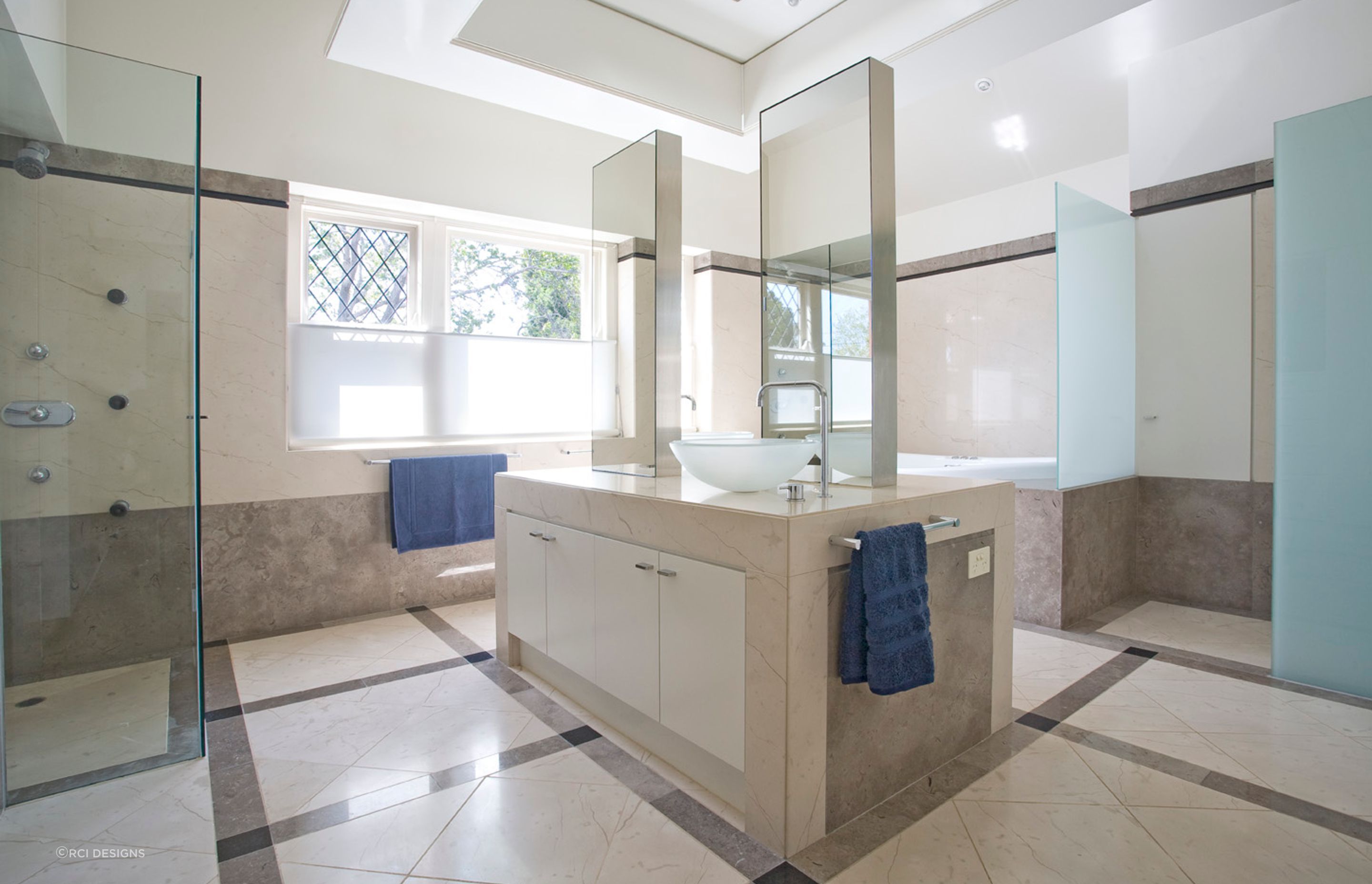 Stylish floor and wall tiles have been used to perfection in this bathroom space. Featured Project: Studley Park Bathroom by RCI Designs