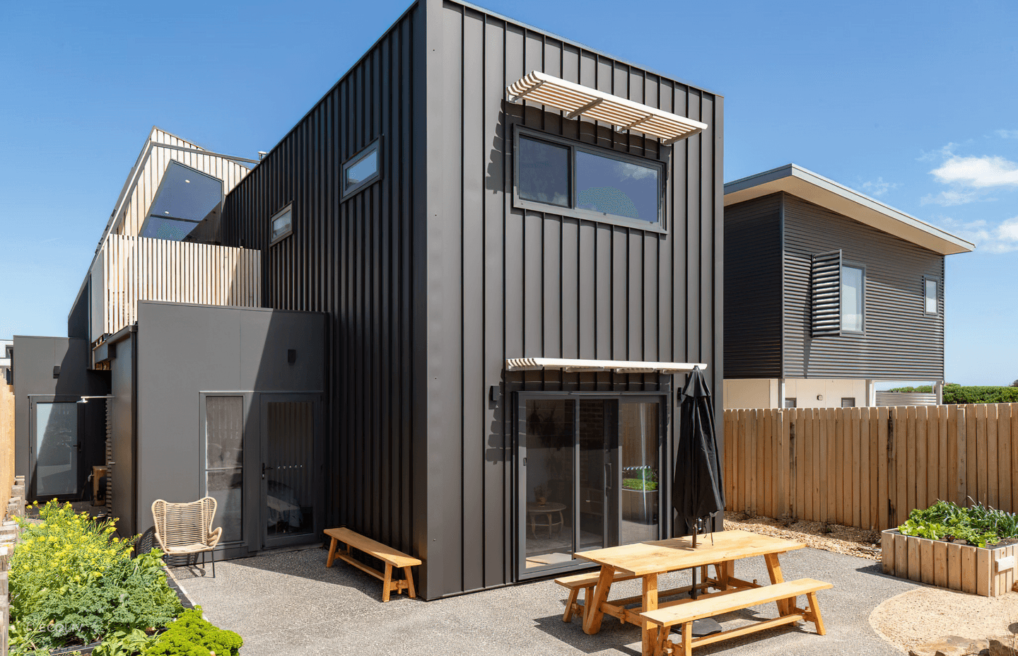 A metal façade can set the tone for a home's overall style. Featured Project: The Cape Project by ECOLIV