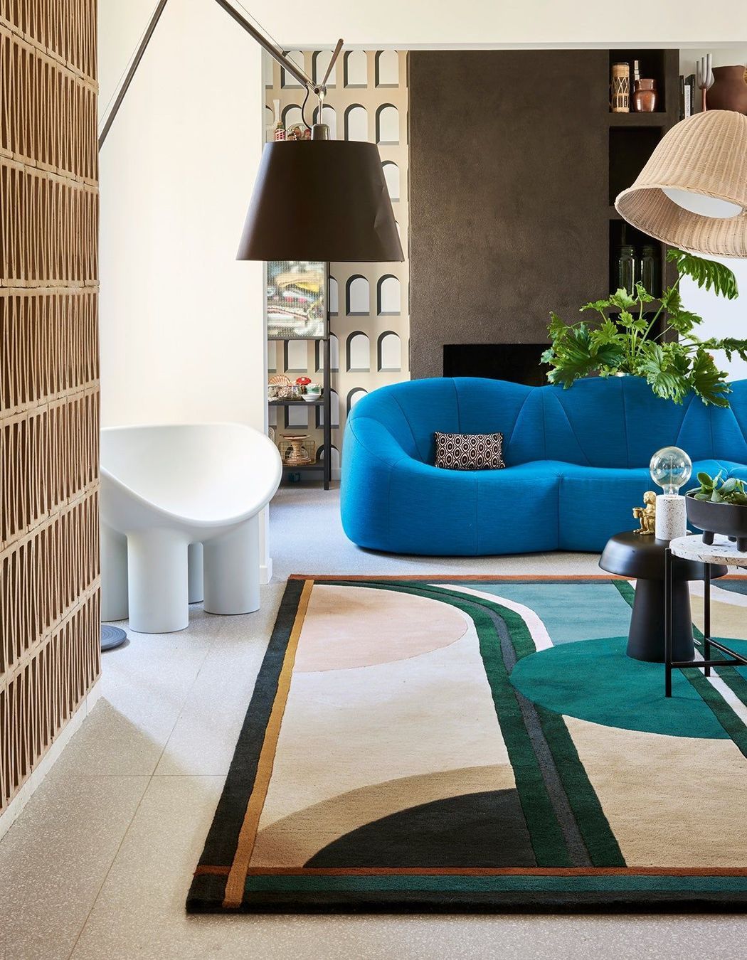 The Sonia Rug by top3 by design features a stunning multi-color palette that effortlessly brings the room together