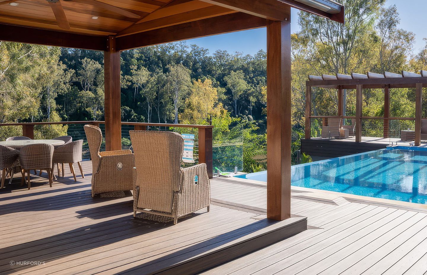 Incorporating a swimming pool into your design results in luxurious living, especially when complemented by a quality product like Trex® Decking By Hurford's.