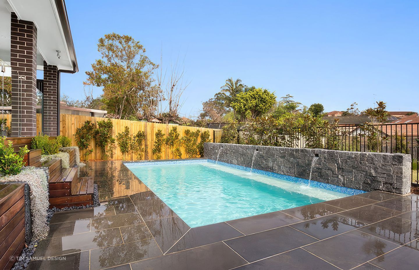 North Road Project: Spotted gum decking stairs which double as pool side bench seats.