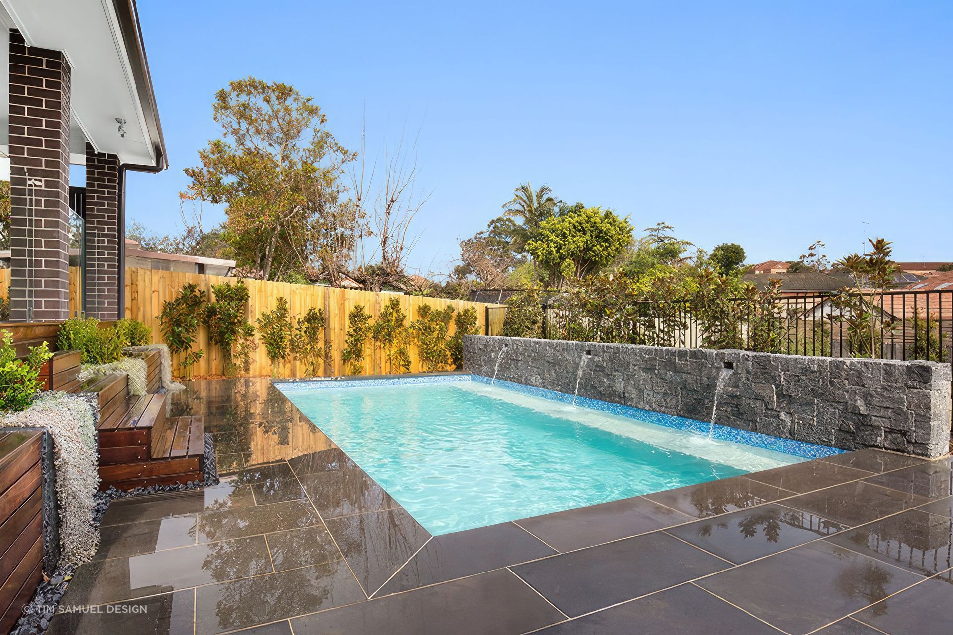 North Road Project: Spotted gum decking stairs which double as pool side bench seats.