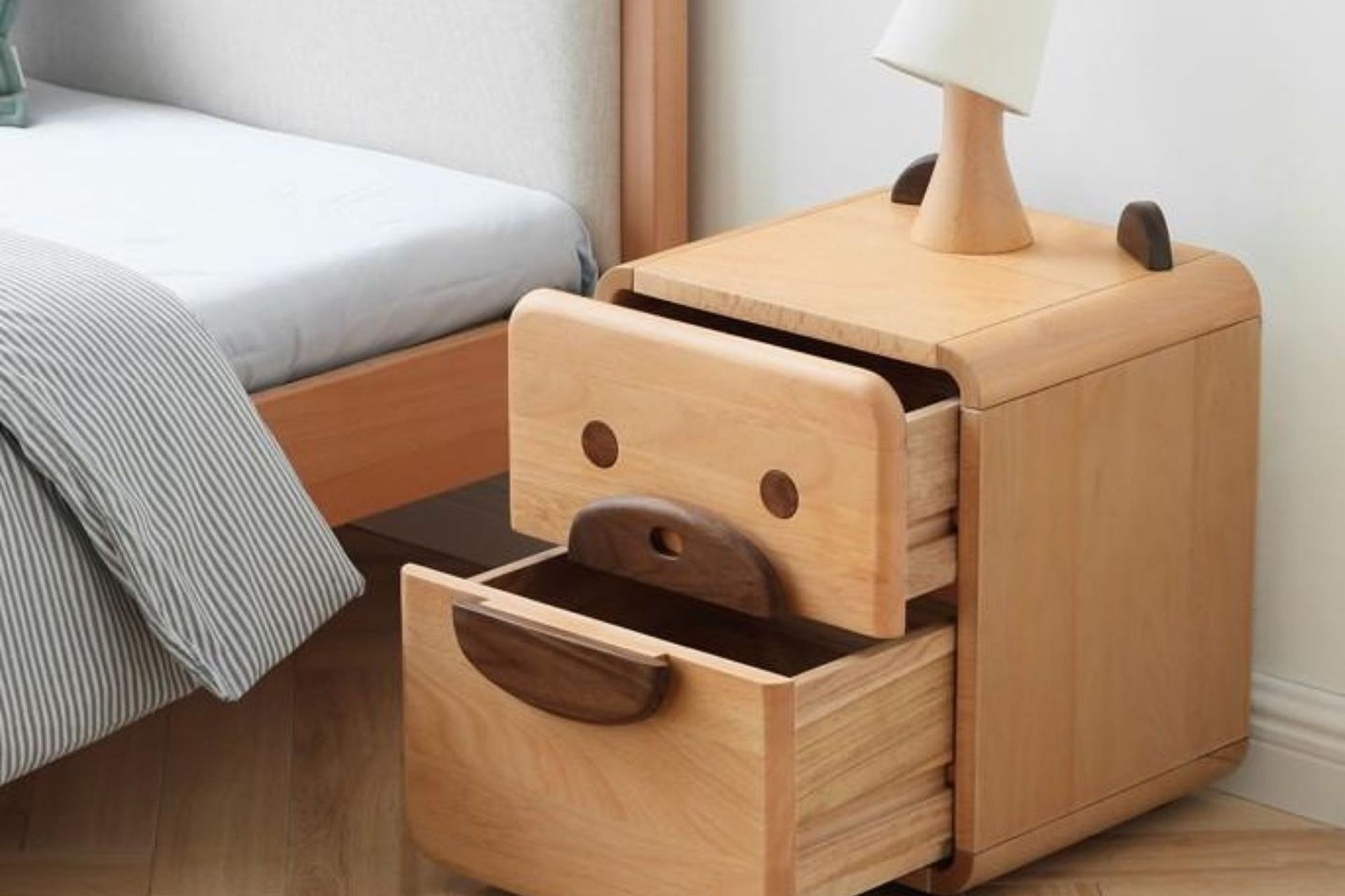 Kid's bedside tables can be playful and fun like the Urban Kidz Animal Oak Bedside Table.