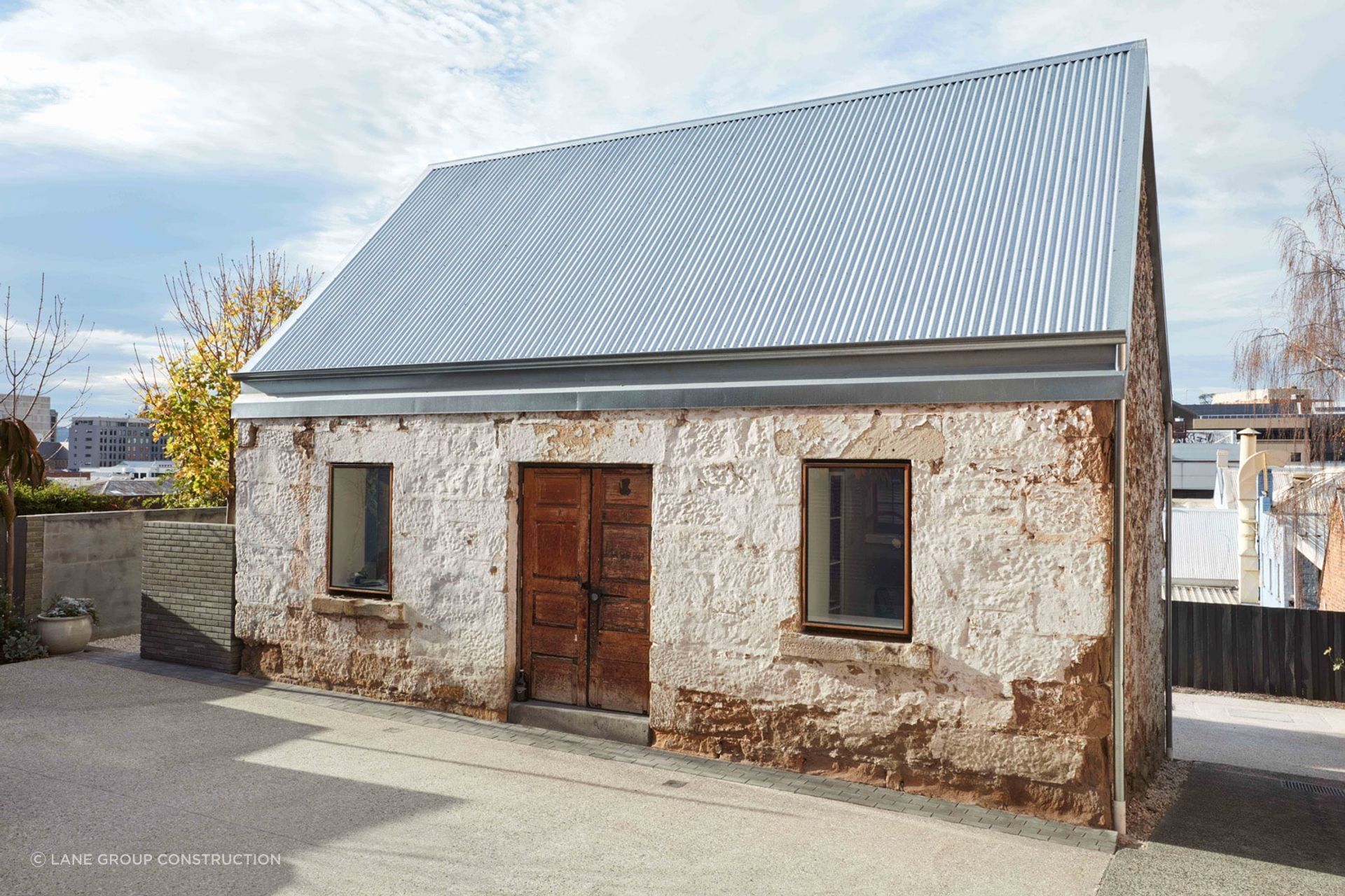 Weathered front doors infuse homes with a sense of history. Featured project: The Barn by Lane Group