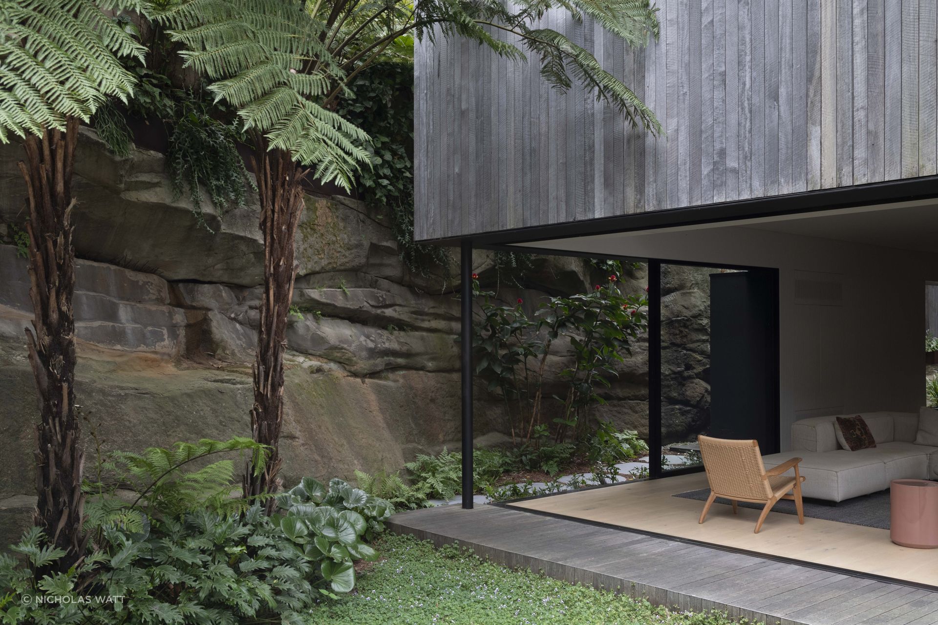 The seamless landscaping at Quarry house integrates with architecture of the home.