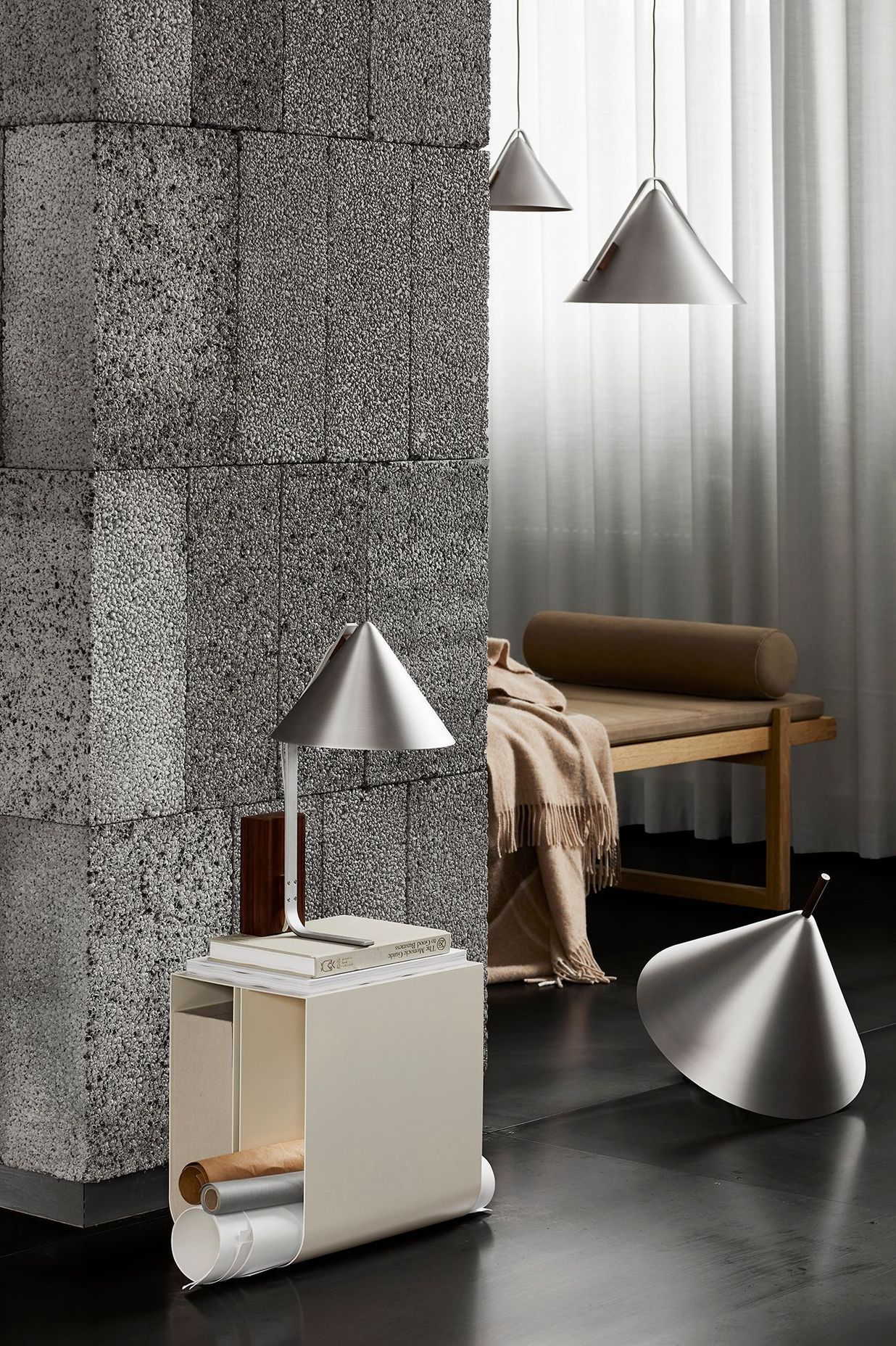 The Conical collection available in hanging, table and floor lamp.