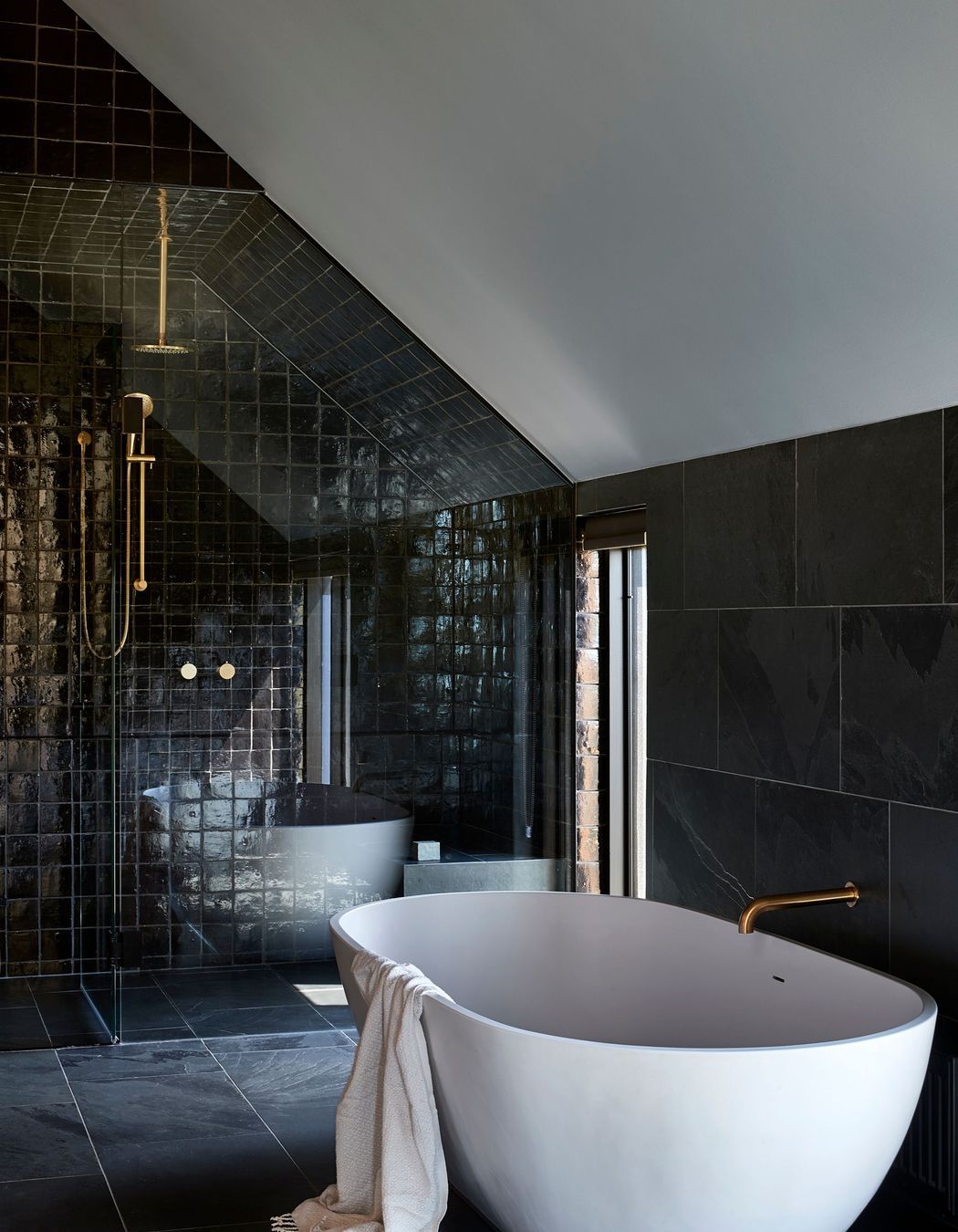 An oversized glass shower at Flinders Residence | Photography by Shannon McGrath