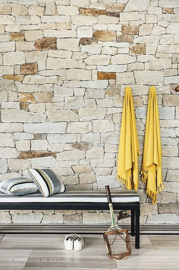 Beach towels complementing South Beach Stripe Upholstery by Mokum.