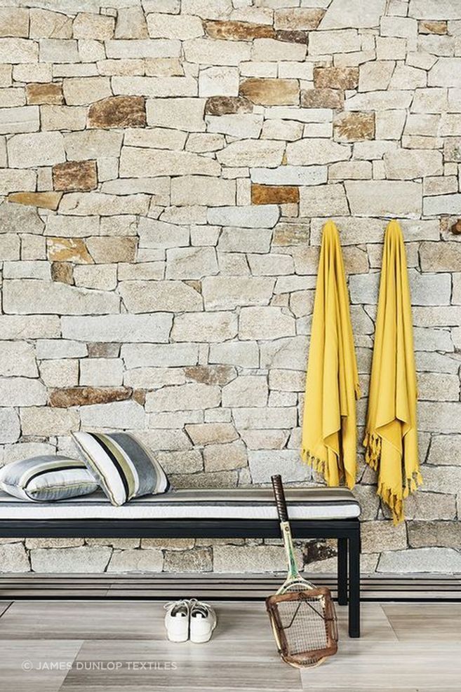 Beach towels complementing South Beach Stripe Upholstery by Mokum.