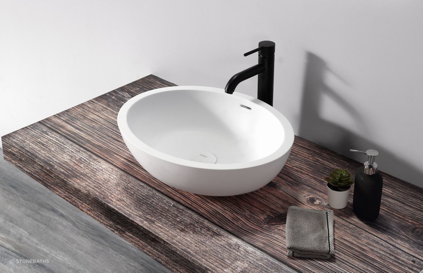 Vessel basins like the B1306-1 Hugi Oval Vessel Basin from Stonebaths, intentionally draw the eye.