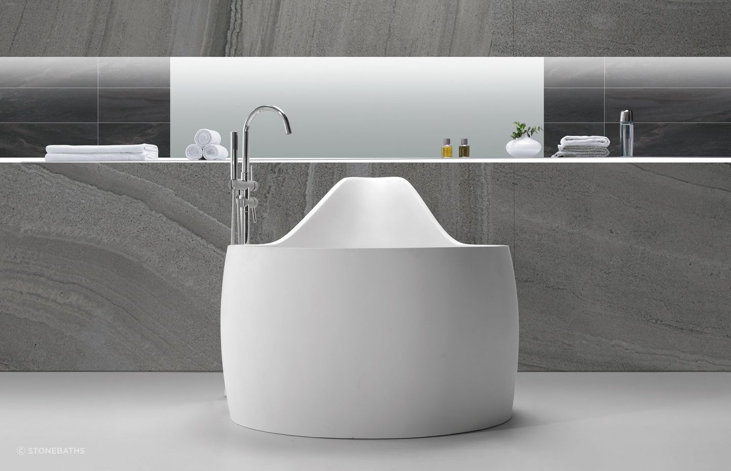 The unique and stylish B070 Large Hugi Soak Tub from Stonebaths