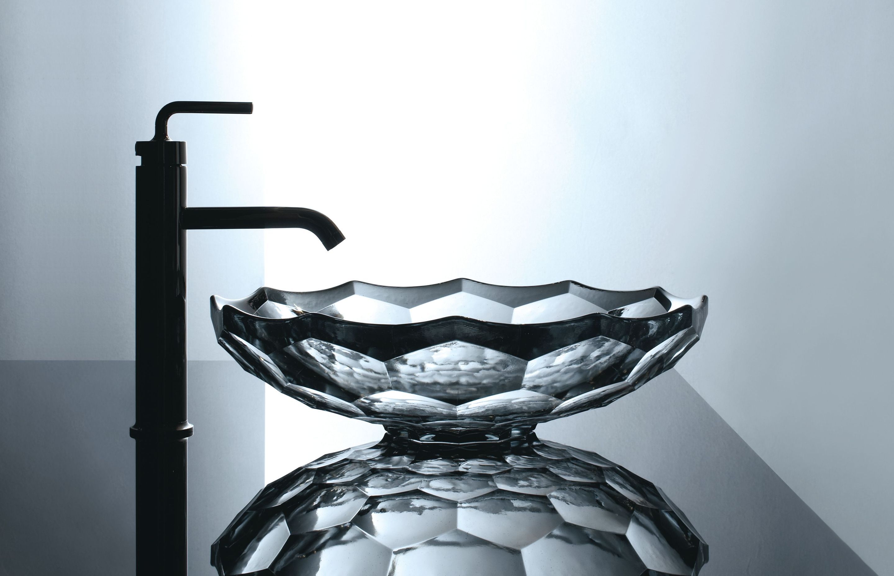 Glass sinks are unique, elegant, easy to clean and do not retain stains.