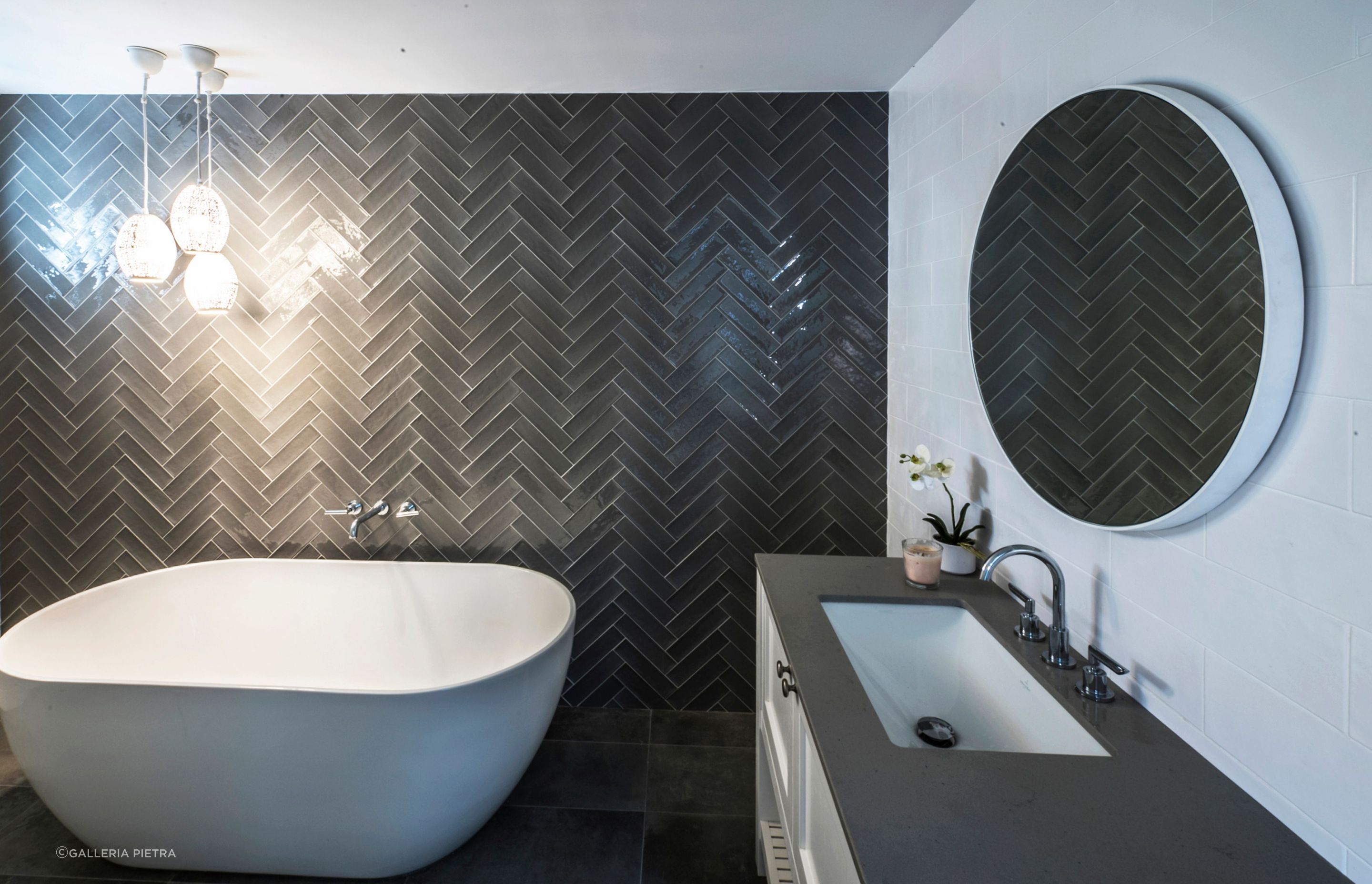 A feature wall of smokey grey glazed subway tiles in Bondi - Photography: George Gittany