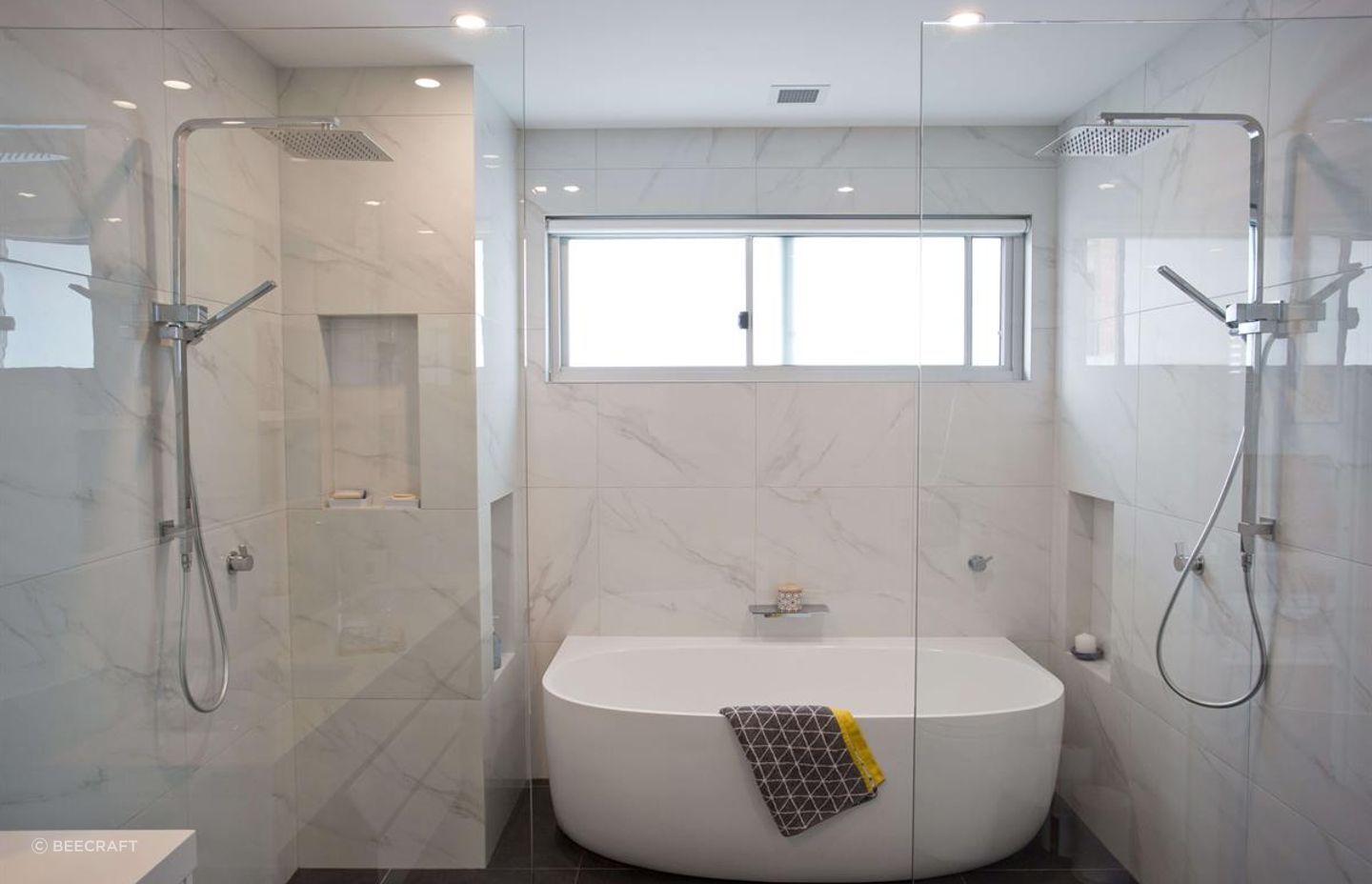 Glass shower screens feature at a first floor addition at Dee Why - Photography: Lachlan Carey
