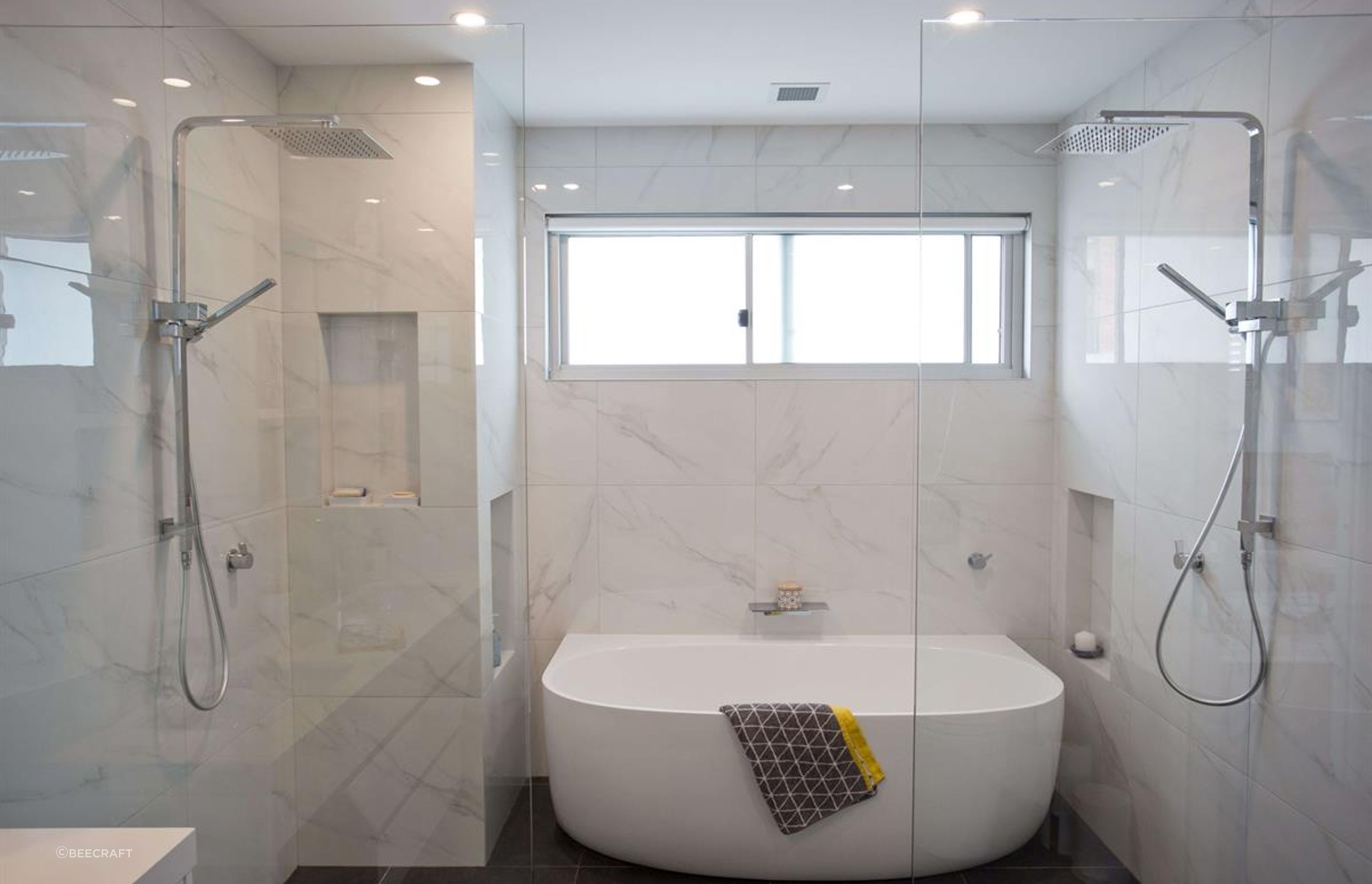 Glass shower screens feature at a first floor addition at Dee Why - Photography: Lachlan Carey