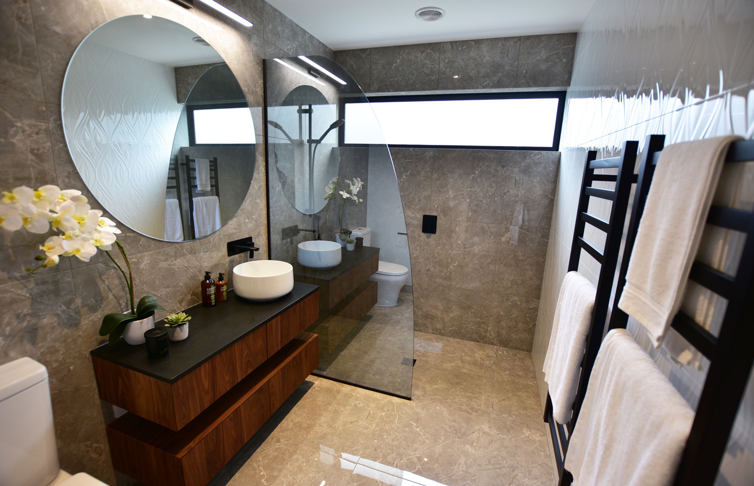 Create a bathroom as individual as you are with elements including custom shower screens, Eclipse LED mirrors and quality hardware designed to match your bathroom fixtures and fittings.
