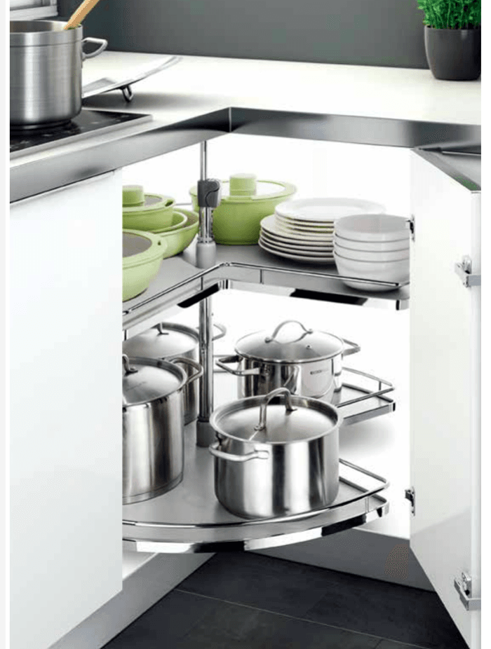 A fine collection of saucepans stored in a Kitchen Cupboard Carousel from the Renovator Store