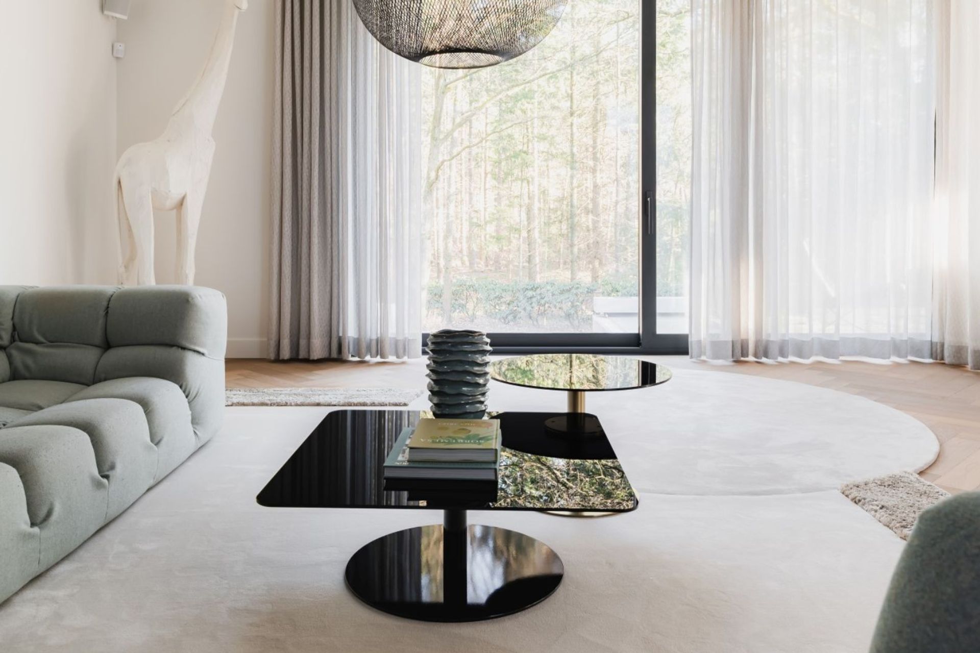 Define zones with rugs and carpet.