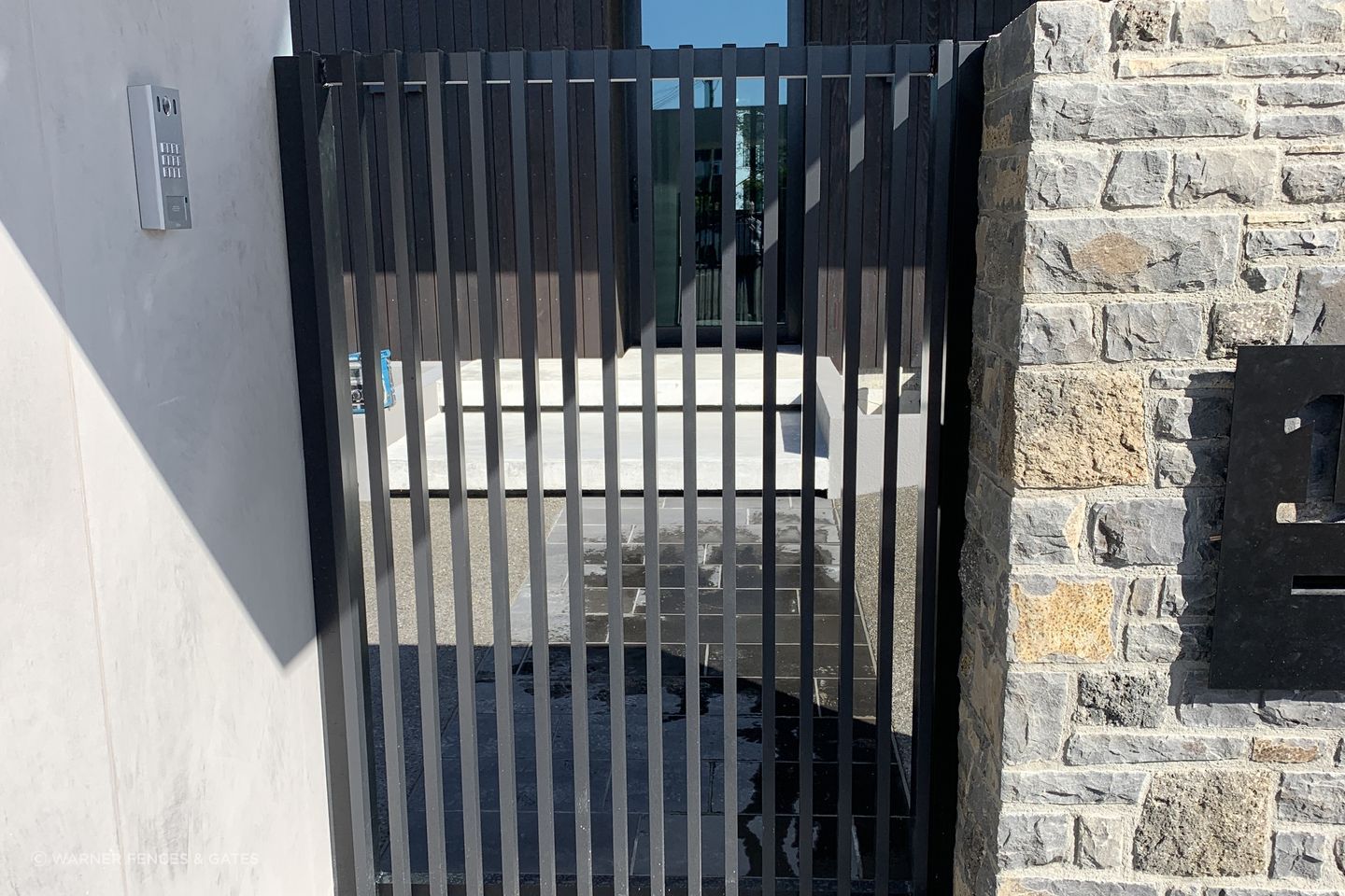 All of the joinery in the fencing and gate is powder coated in Colorsteel’s Flaxpod Matt.