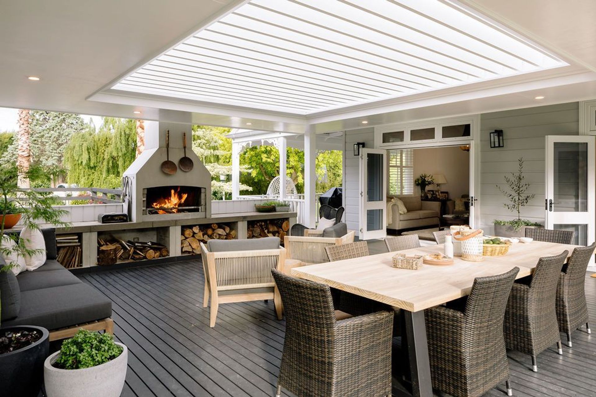 Louvres help make an outdoor space feel more like a 'room'.