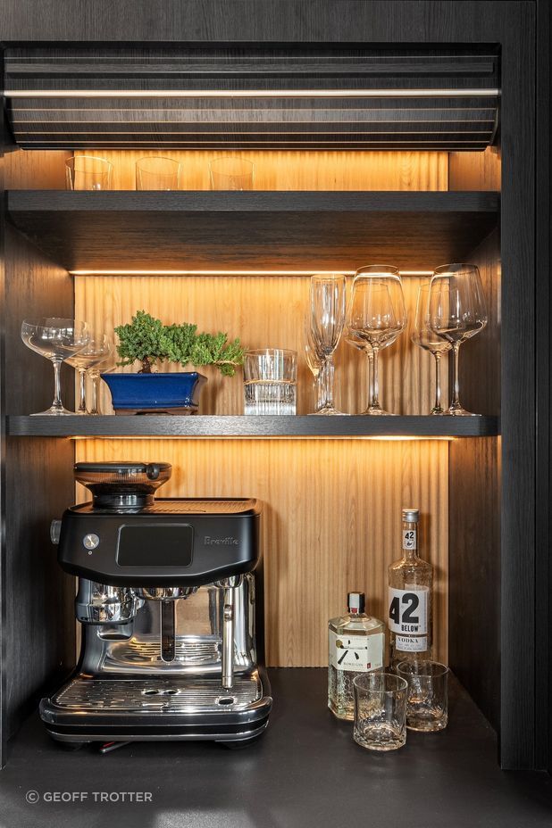 “The clients are steel fabricators, so aesthetically they wanted old-meets-new, dark, pops of oak, and a nod to steel that complemented the Rimu joinery.”