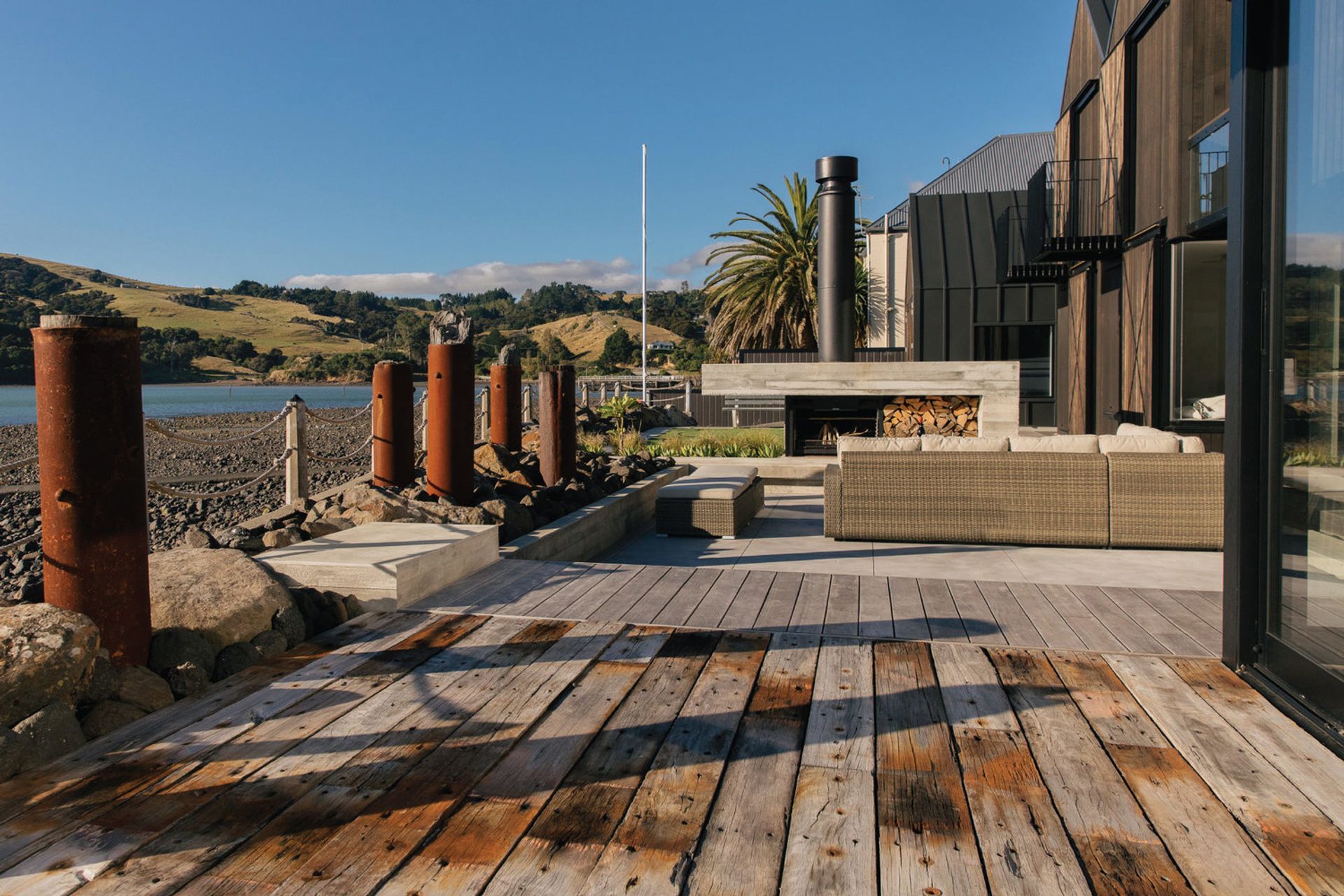 A sunken seating area, like this in this exquisite Akaroa residence, provides a cosy and intimate social space.