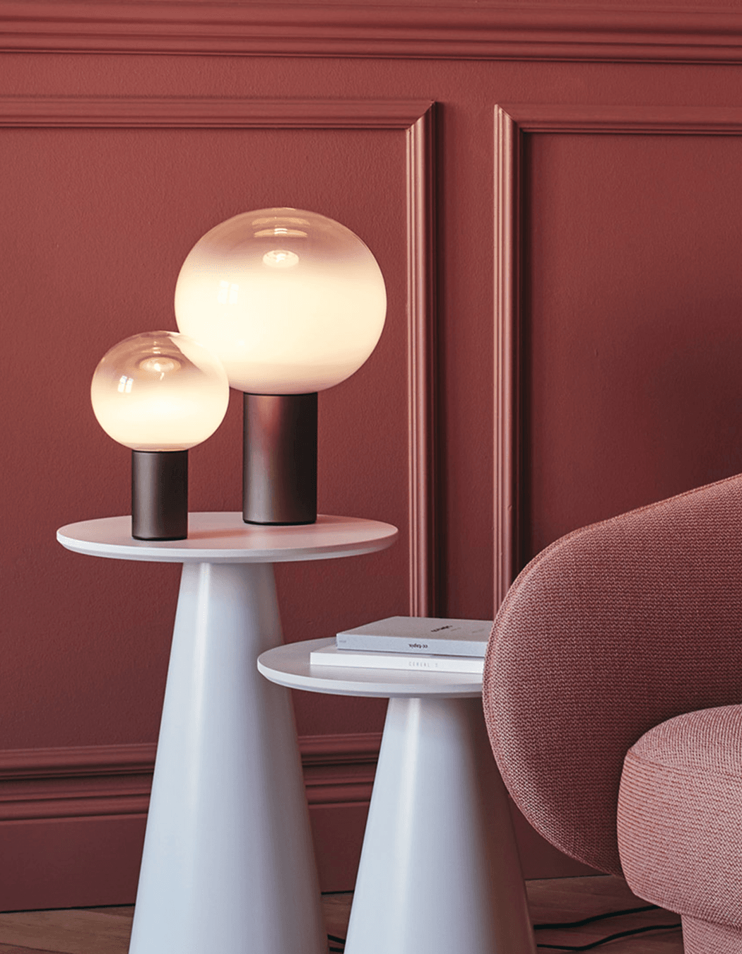 The stunning spherical lamp of the Laguna Table Lamp by Artemide is a real eye-catching feature.