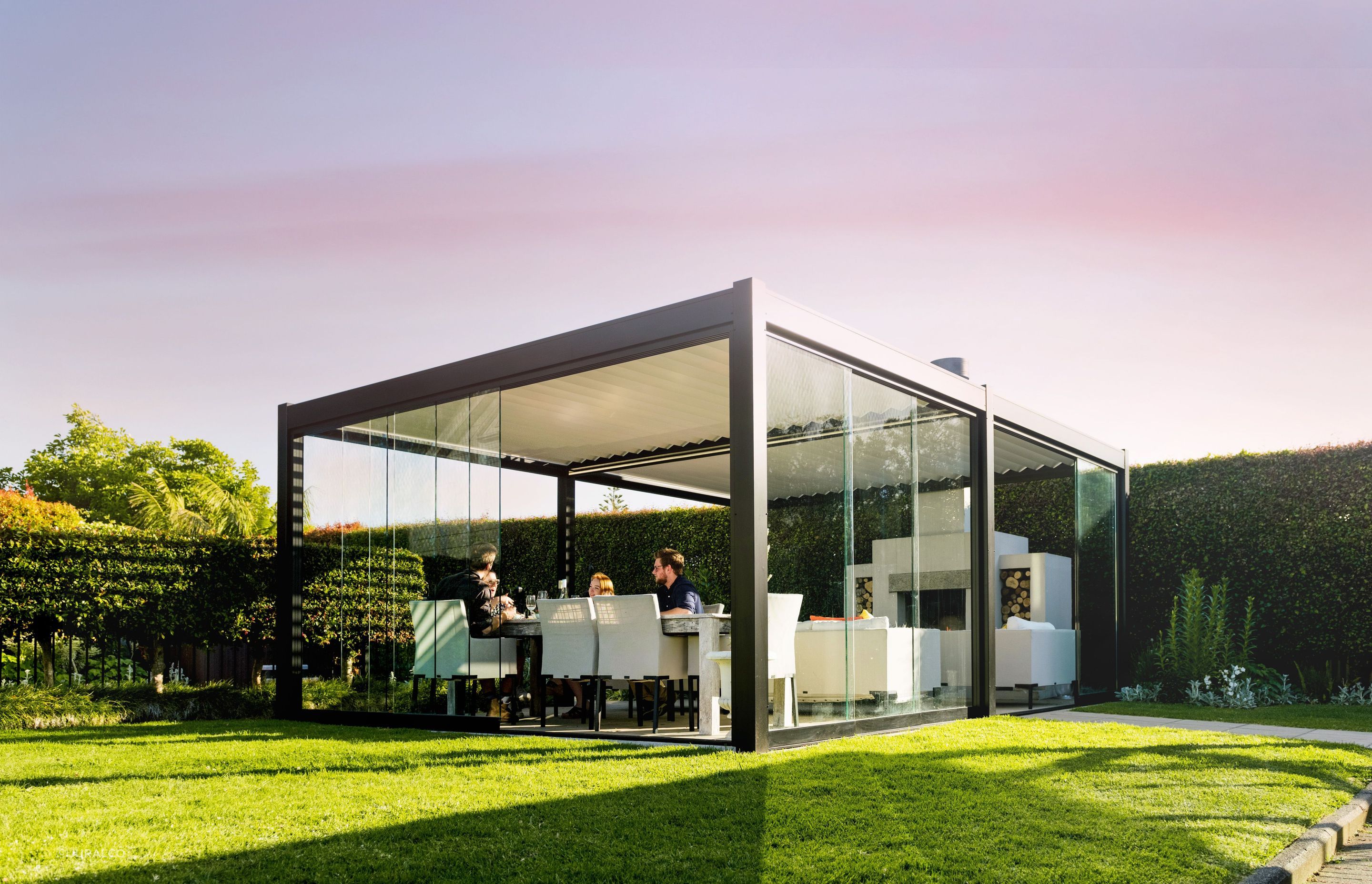 Sliding glass doors or dropdown awnings can be added to Juralco's outdoor living systems to increase their functionality and comfort year-round.