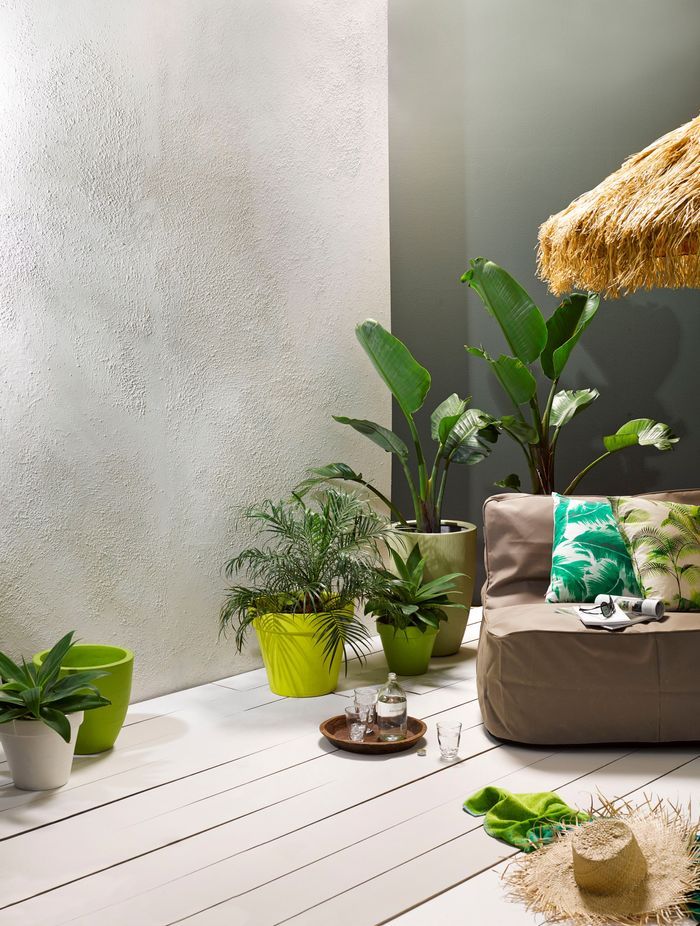 Deep dark greens perfectly contrast with lighter exterior elements.