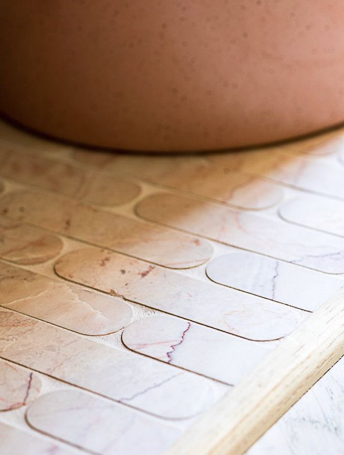 Pez Natural Stone Rosetta mosaic tiles from Perini Tiles were another beautiful addition to this project.