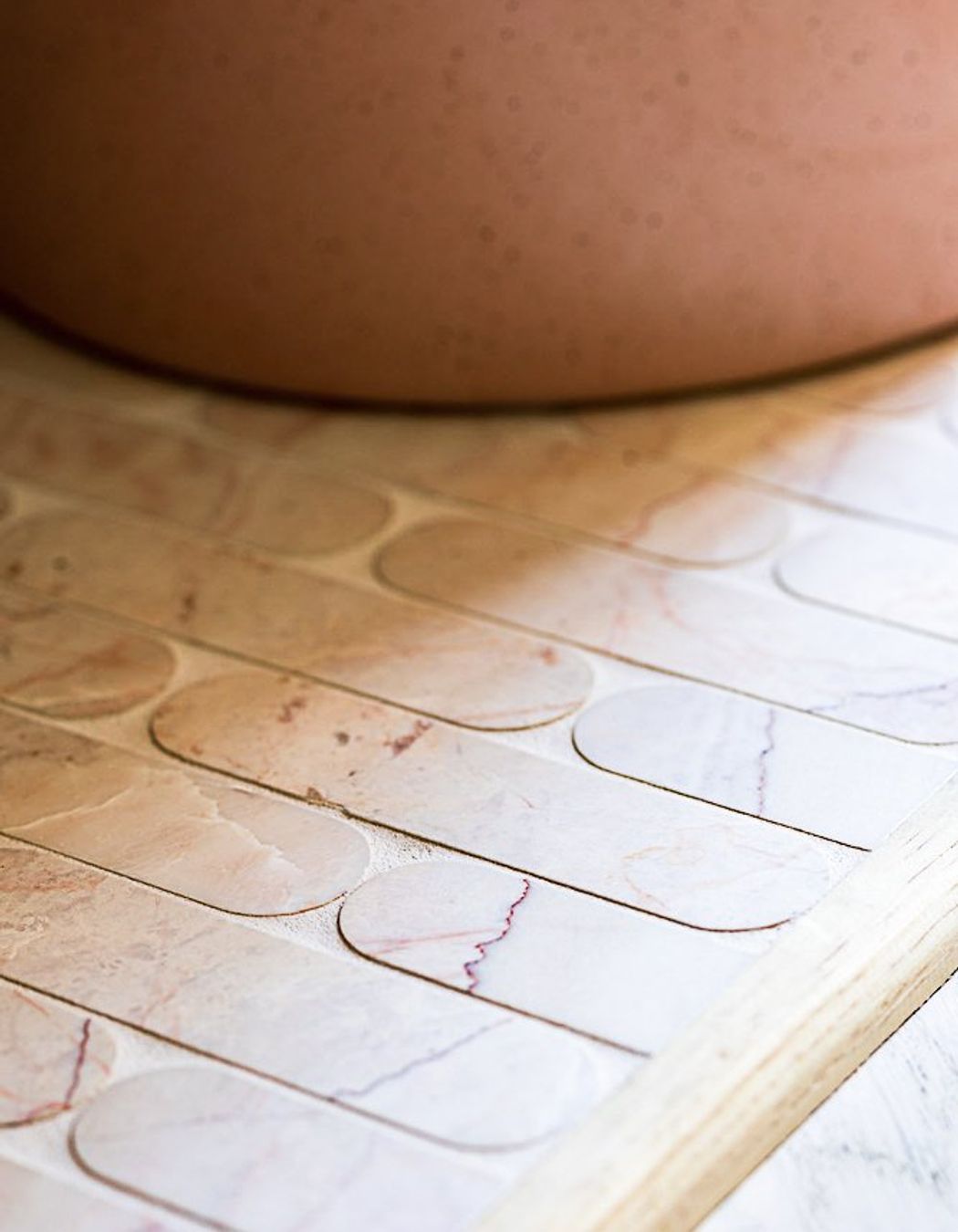 Pez Natural Stone Rosetta mosaic tiles from Perini Tiles were another beautiful addition to this project.