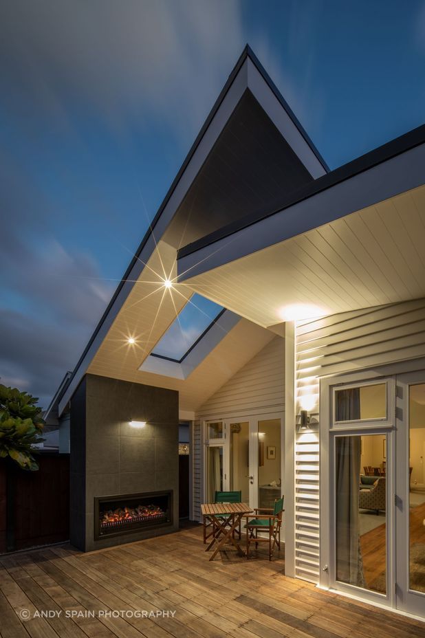 Woburn Villa was transformed by Hark Architects, adding a modern and warm extension at the rear of the house.