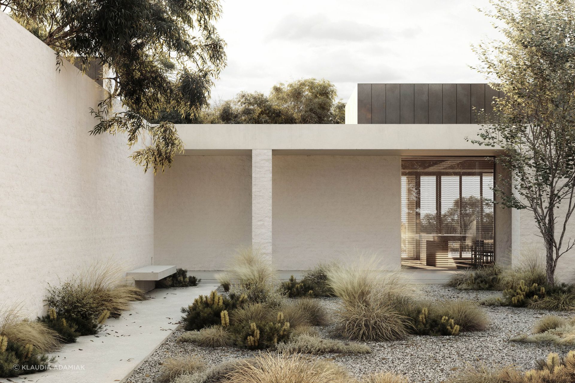 At HMM Residence, a sheltered central forecourt creates an intimate garden threshold, tempering the rural elements before the home opens towards the valley beyond.