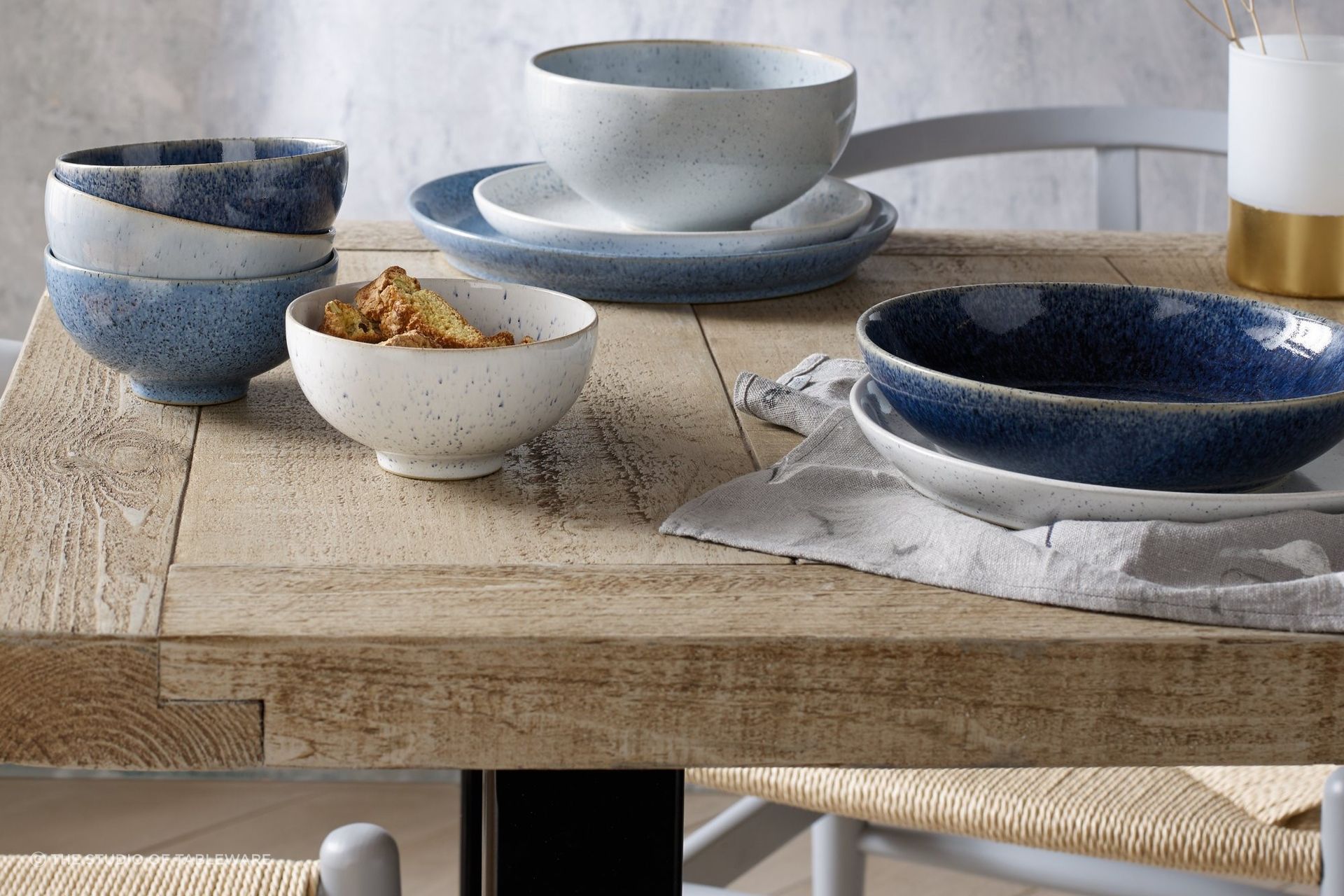 The stunning Studio Blue Dinnerware set shows just how much high-quality table settings can enhance a dining room.