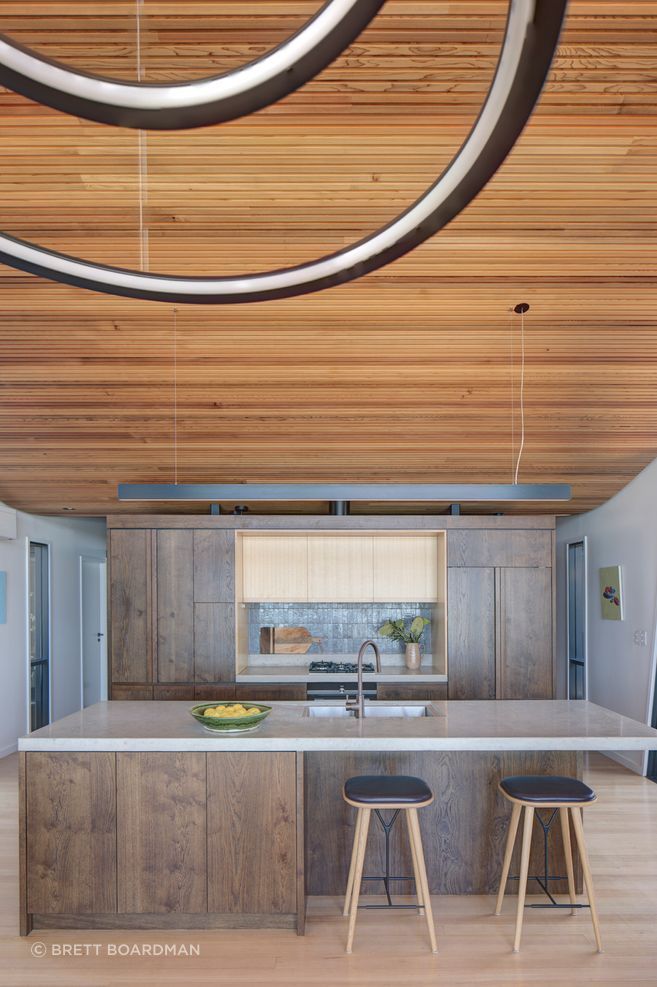Task lighting has been installed over the kitchen island bench.