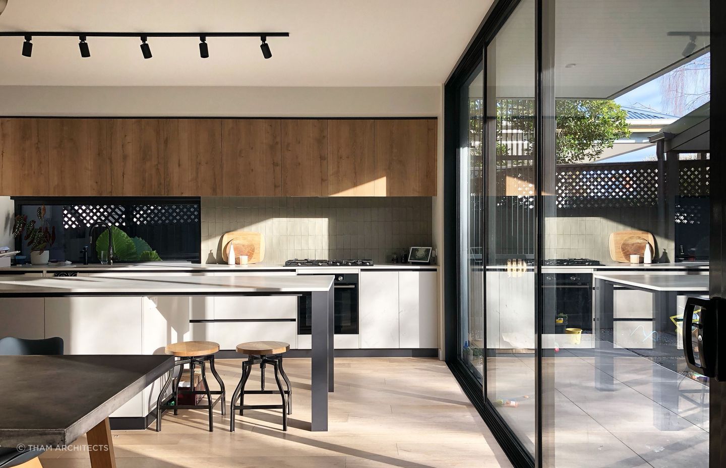 Completed in 2022, the transformation of this Edwardian period home into a contemporary masterpiece is a testament to Tham Architects' design philosophy.