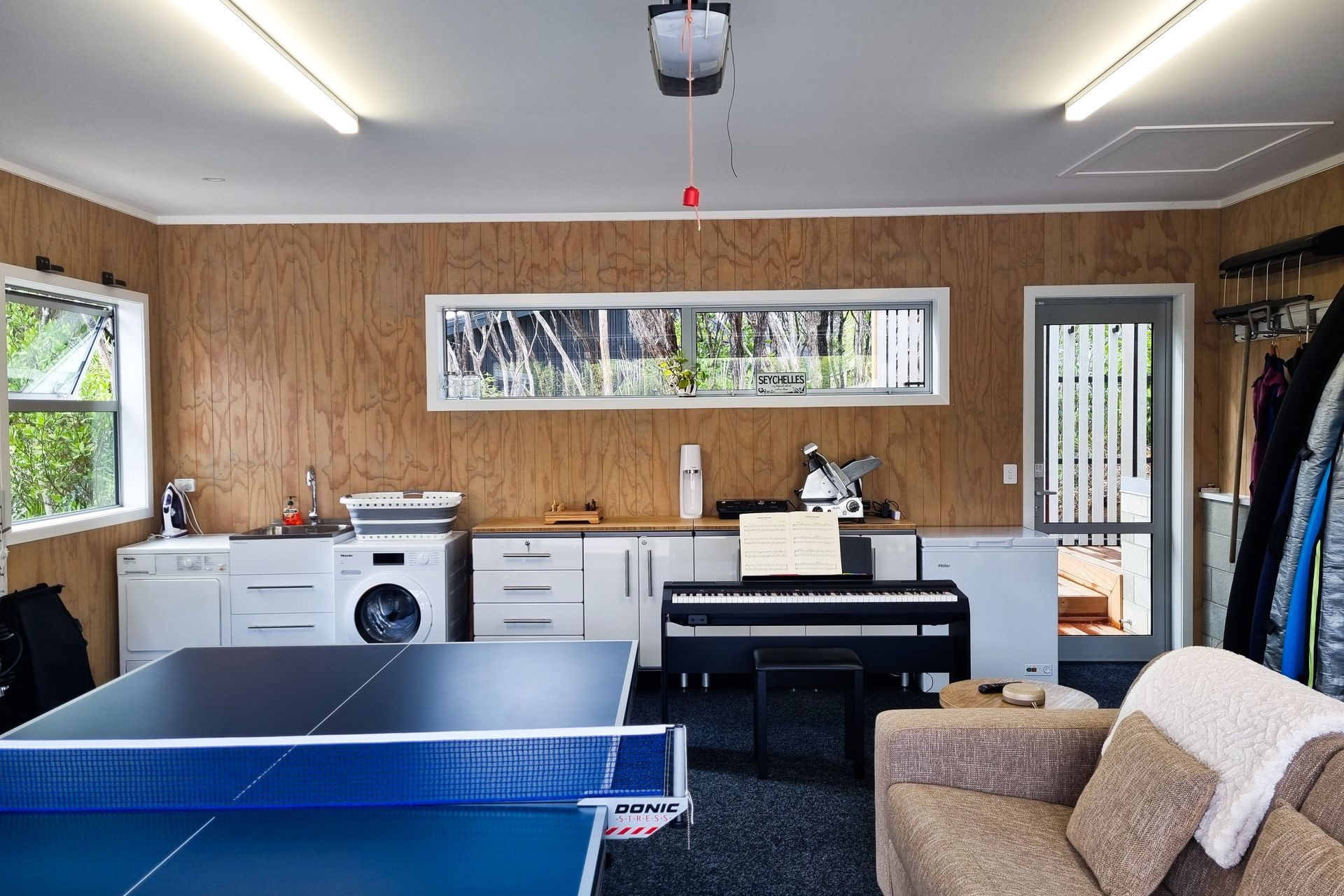 A base cabinet combo with a custom bamboo bench top was installed for a clean food prep and storage area.