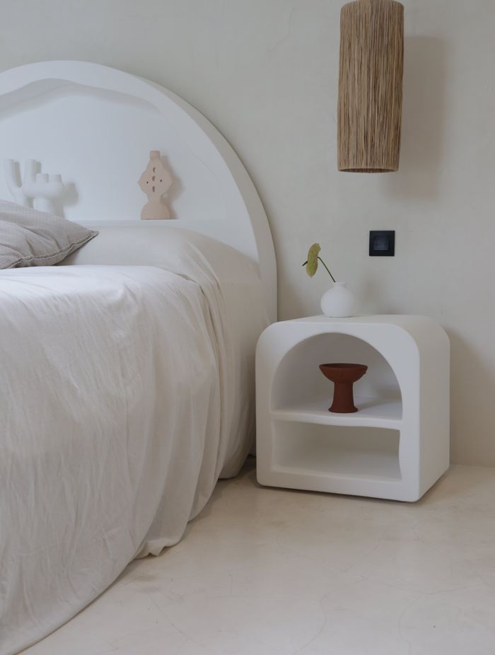 Mediterranean bedside tables, such as this Majorca Side Table, offer clean design and a unique take on practical storage spaces.