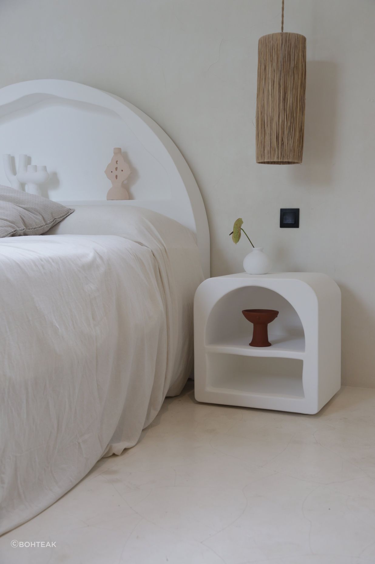 Mediterranean bedside tables, such as this Majorca Side Table, offer clean design and a unique take on practical storage spaces.