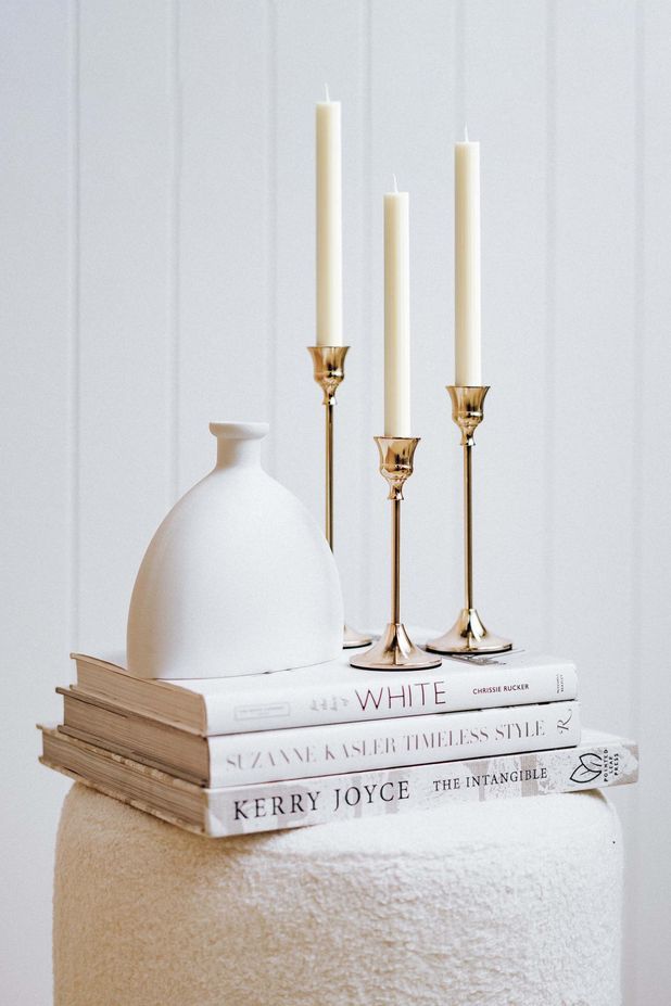 Three-piece candle stick set in French Gold by Ivory & Deene