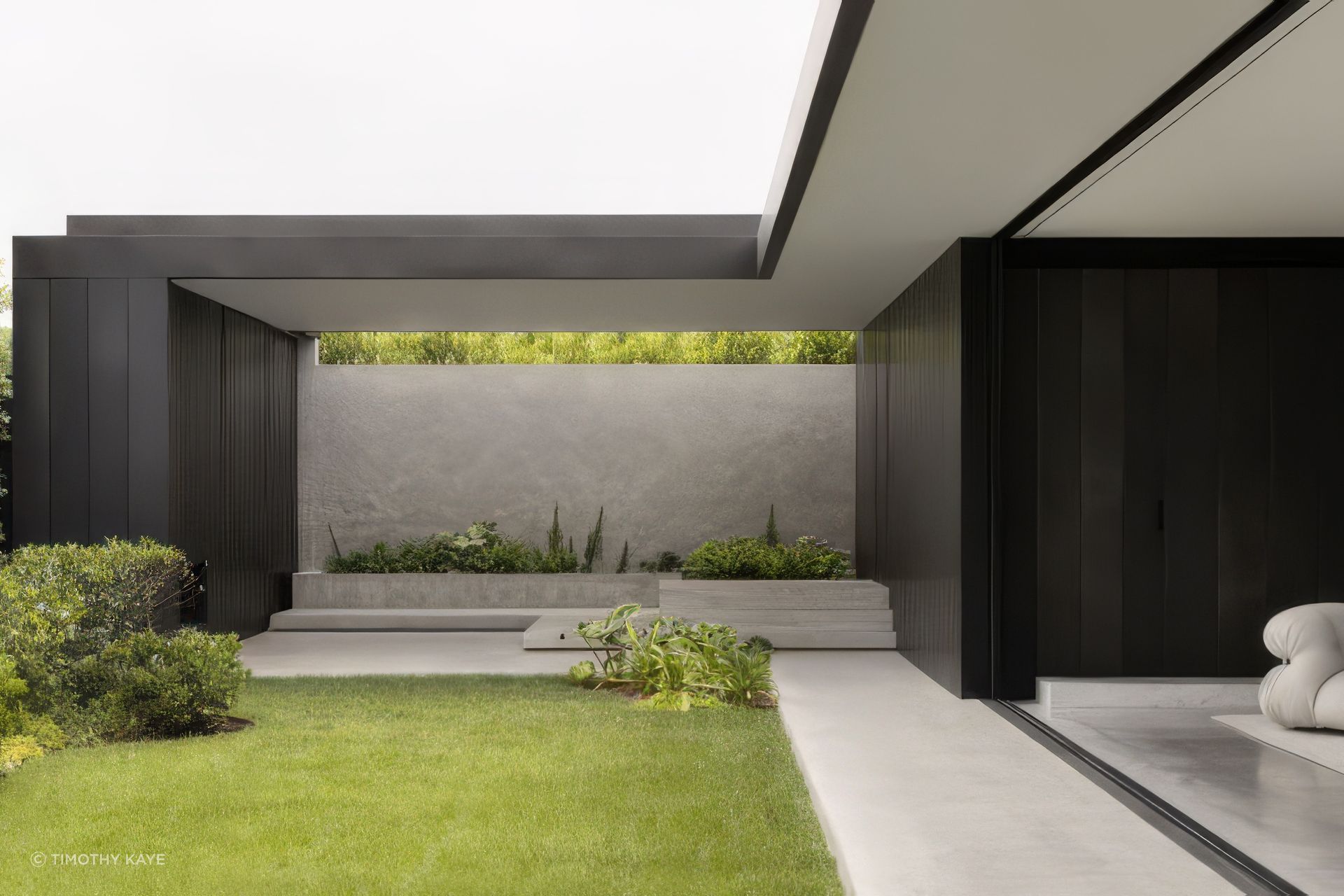 The boundaries between interior and exterior dissolve at Williamstown Residence.
