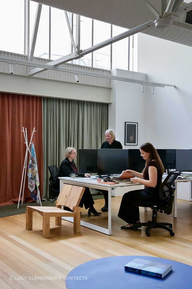 The open plan light filled space allows for maximum collaboration. Believe it or not, the curtains originally hung in Lucy's own home.