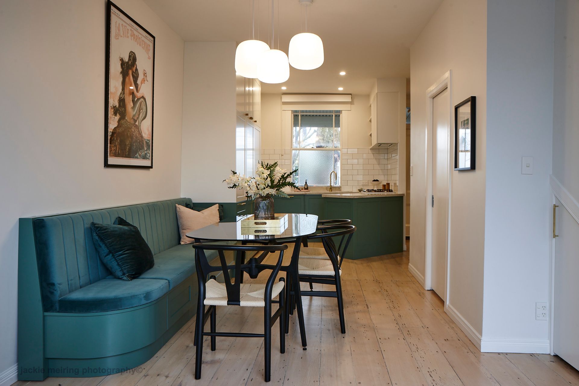 It isn't only walls that can benefit from a coat of paint. In this kitchen, designer Lulu Wilcox has introduced colour to the kitchen cabinets and breakfast bar seating.